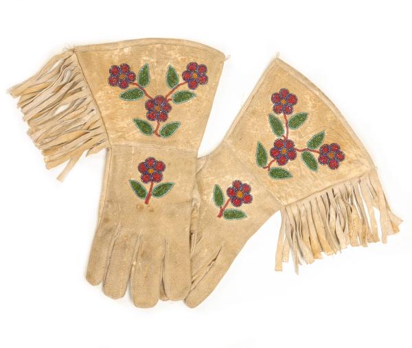 A PAIR OF BEADED HIDE PLATEAU GAUNTLETS