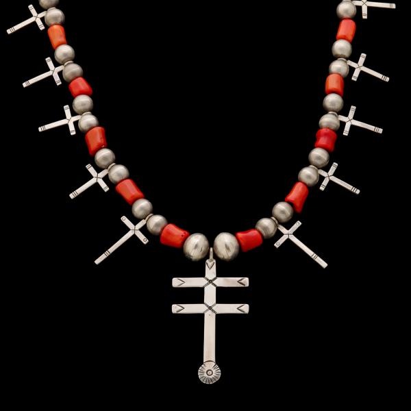A HOPI STERLING AND CORAL NECKLACE WITH