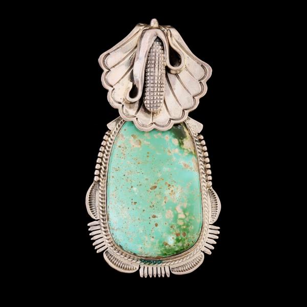 A ROYSTON TURQUOISE PENDANT SIGNED