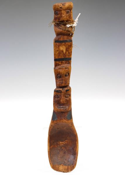 A CARVED SPOON OF UNKNOWN ORIGIN 2f5c3f