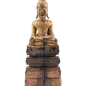 A Carved Giltwood Seated Buddha