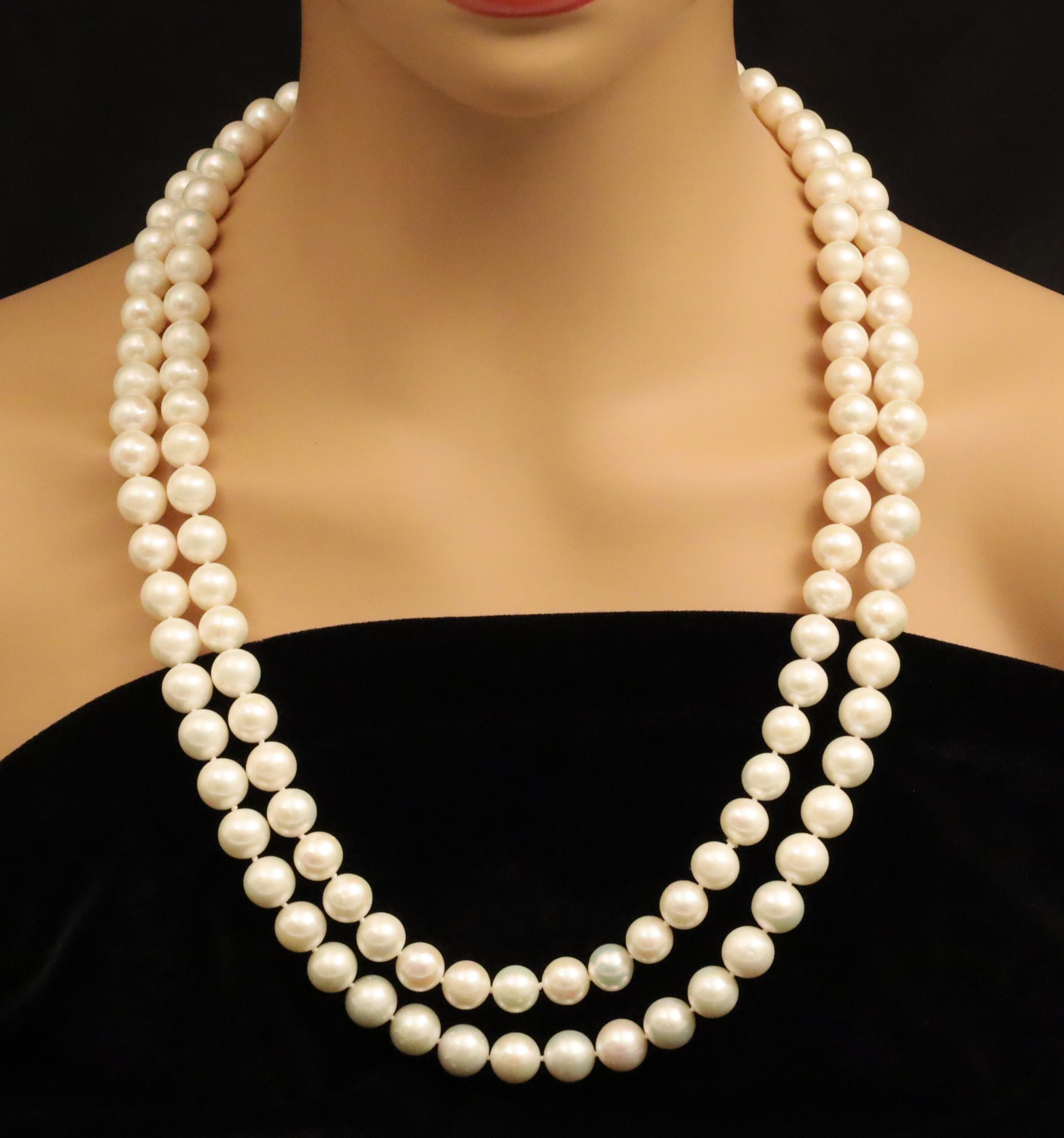 60 CONTINUOUS STRAND OF PEARLS  2f8ea4