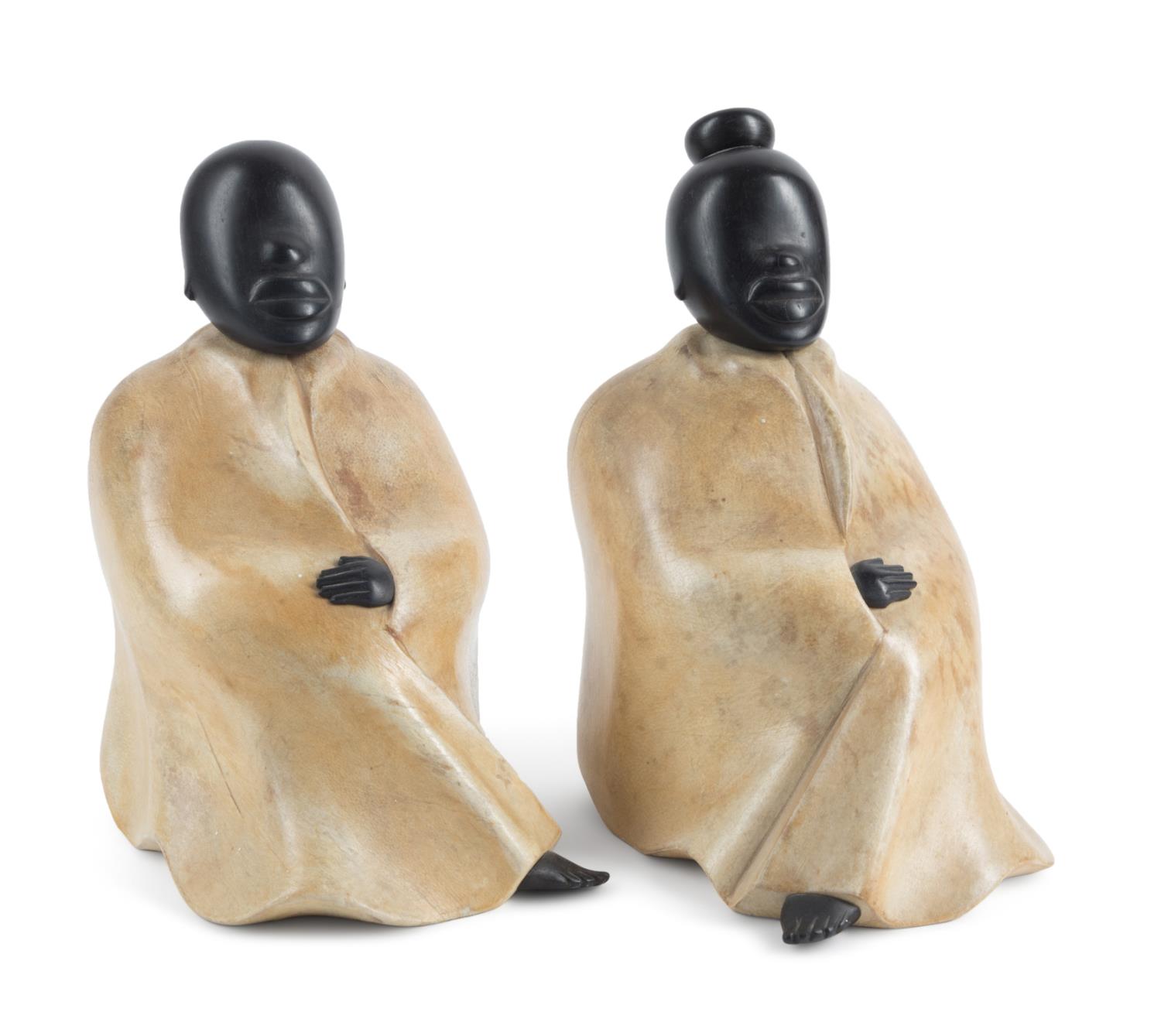 PAIR ALDO TURA SEATED MALE AND