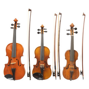 A Group of Three Children's Violins
all