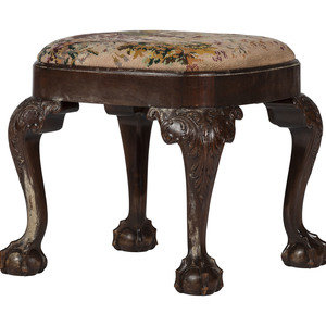 A George II Style Carved Mahogany