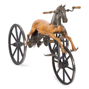 A Carved Wood and Cast Metal Tricycle 2f7879