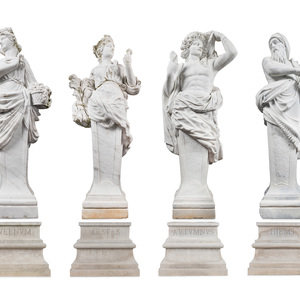 A Set of Four Monumental Carved