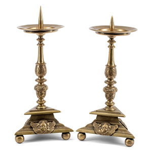 A Pair of Continental Brass Prickets
Probably