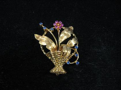 14 karat yellow gold and gem set flower