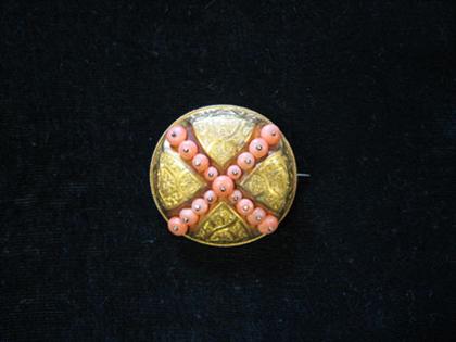 Yellow gold and coral memorial brooch