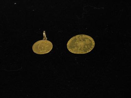 Two yellow gold coins One engraved 4c496