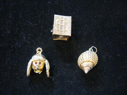 Group of three charms    Shell charm,