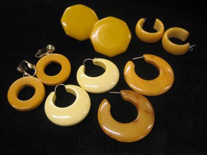 Group of five pair of yellow bakelite 4c4e8