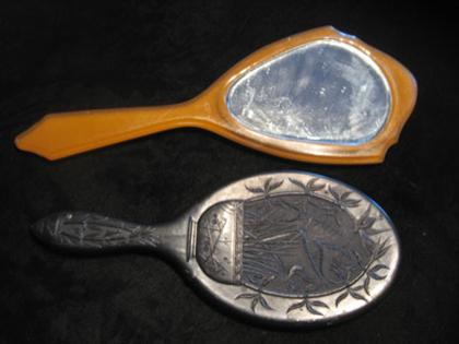 Two early plastic hand mirrors