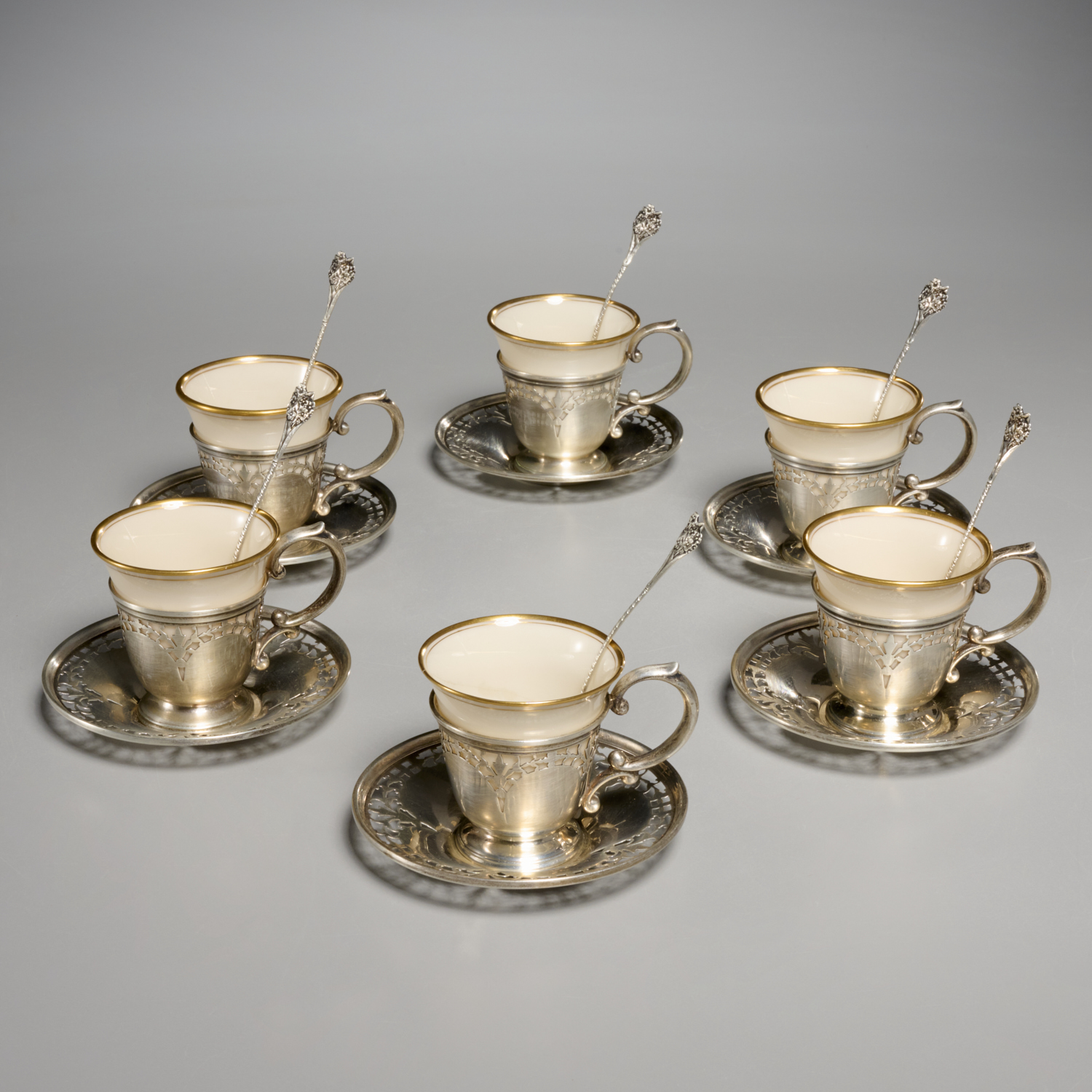 STERLING AND PORCELAIN DEMITASSE SET