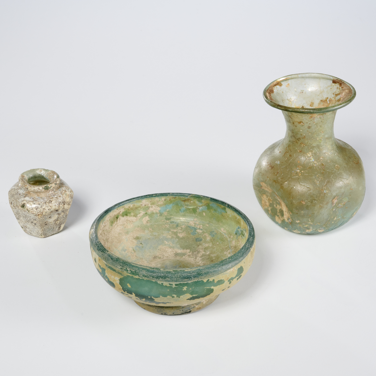 (3) ROMAN STYLE GLASS VESSELS Possibly