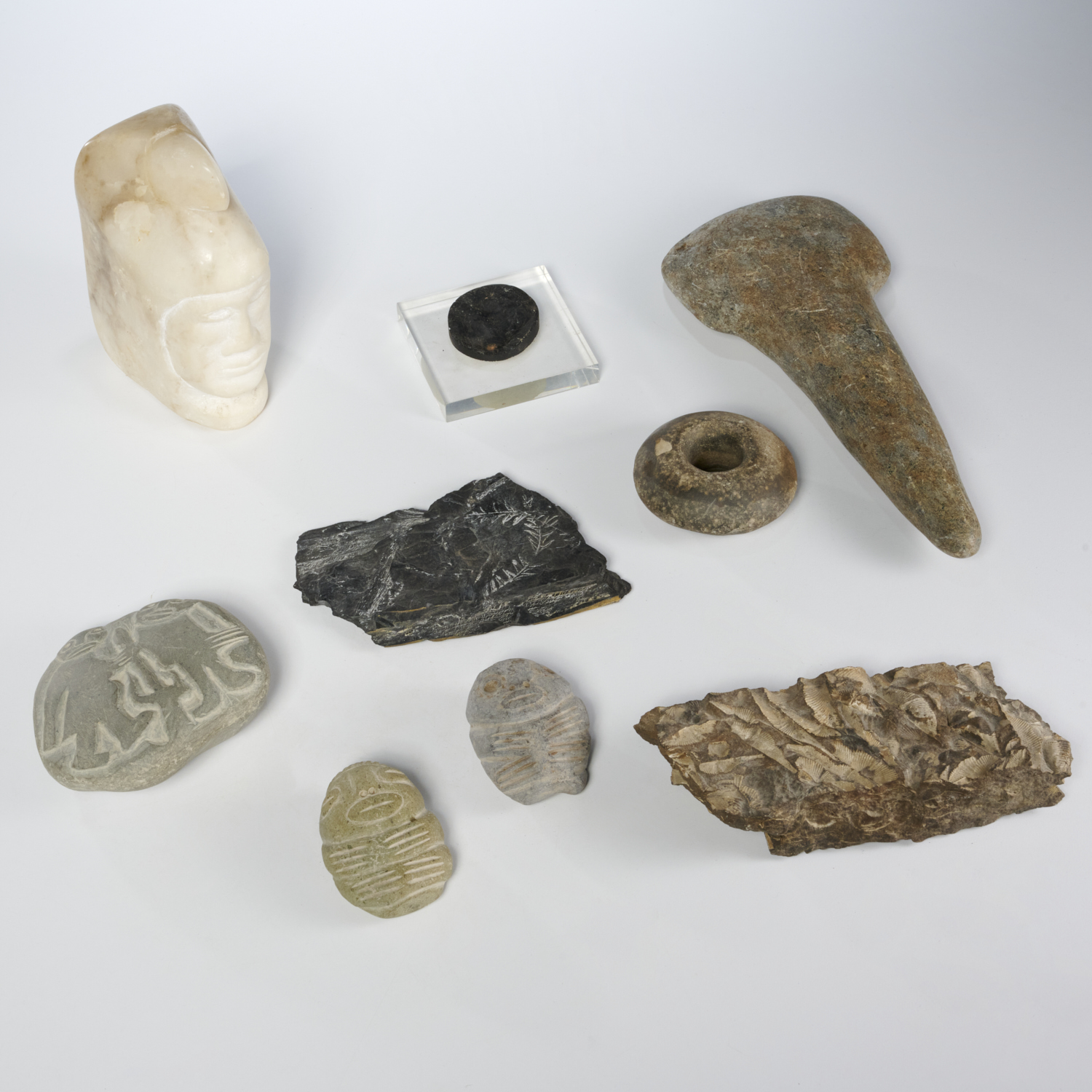 GROUP (9) CARVED STONE OBJECTS