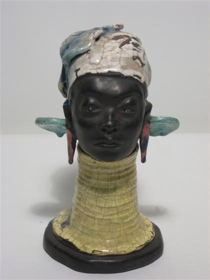 Pottery bust of African woman 