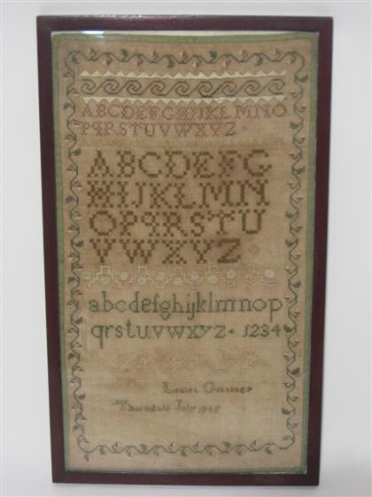 Framed needlework "Alphabet" sampler