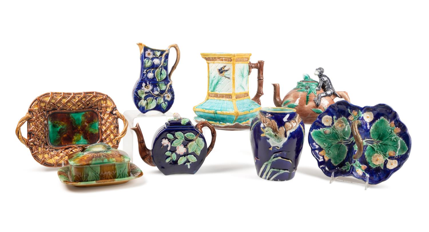 NINE MAJOLICA GLAZED EARTHENWARE TABLE