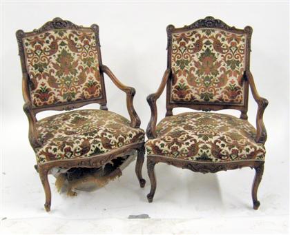 Pair of Louis XV style carved walnut