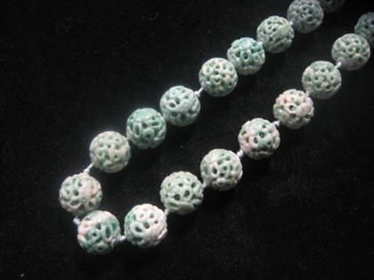 Jade necklace    Twenty-five carved