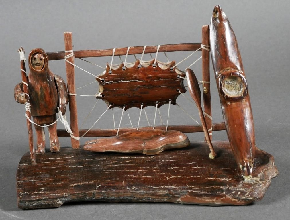 INUIT MAMMOTH IVORY SEAL HUNT SCULPTUREThree