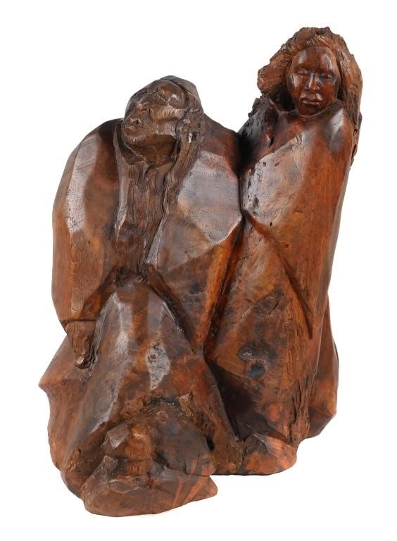 BOOMER CARVED WOODEN FIGURESSculpture