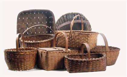 Group of eight splint baskets 