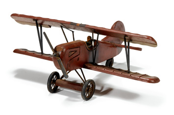 Painted wooden model of a  bi-plane