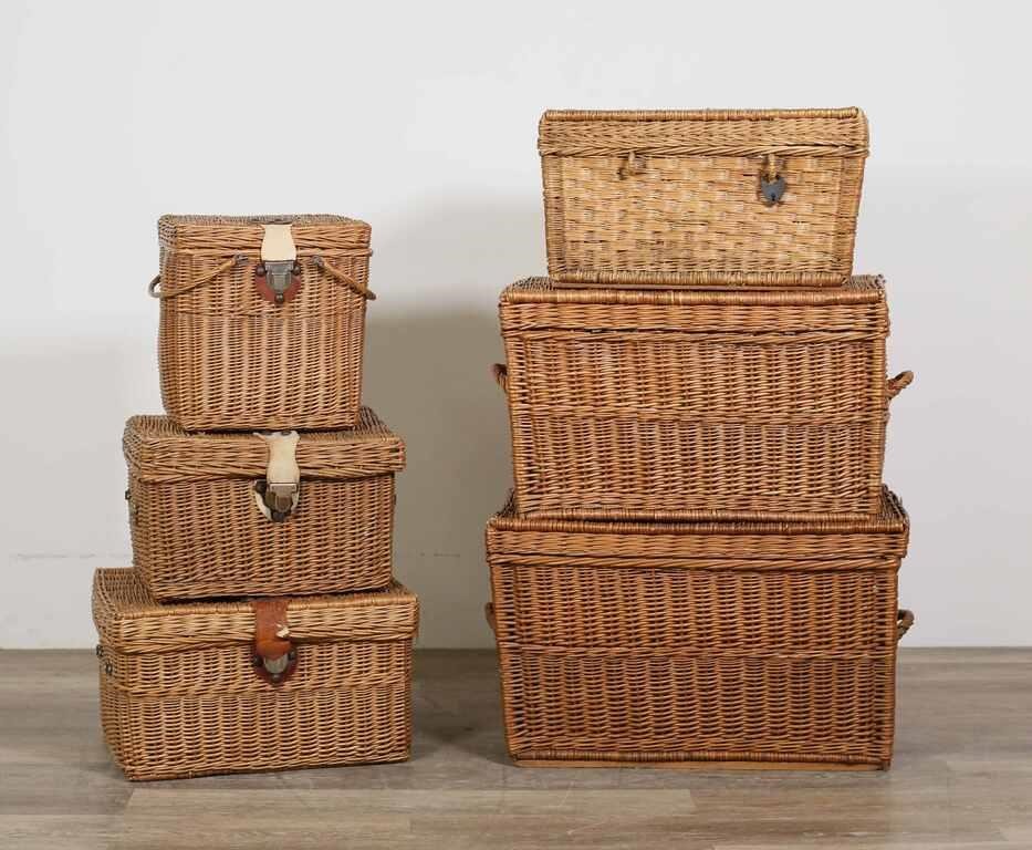 GROUPING OF SIX WICKER TRUNKS AND