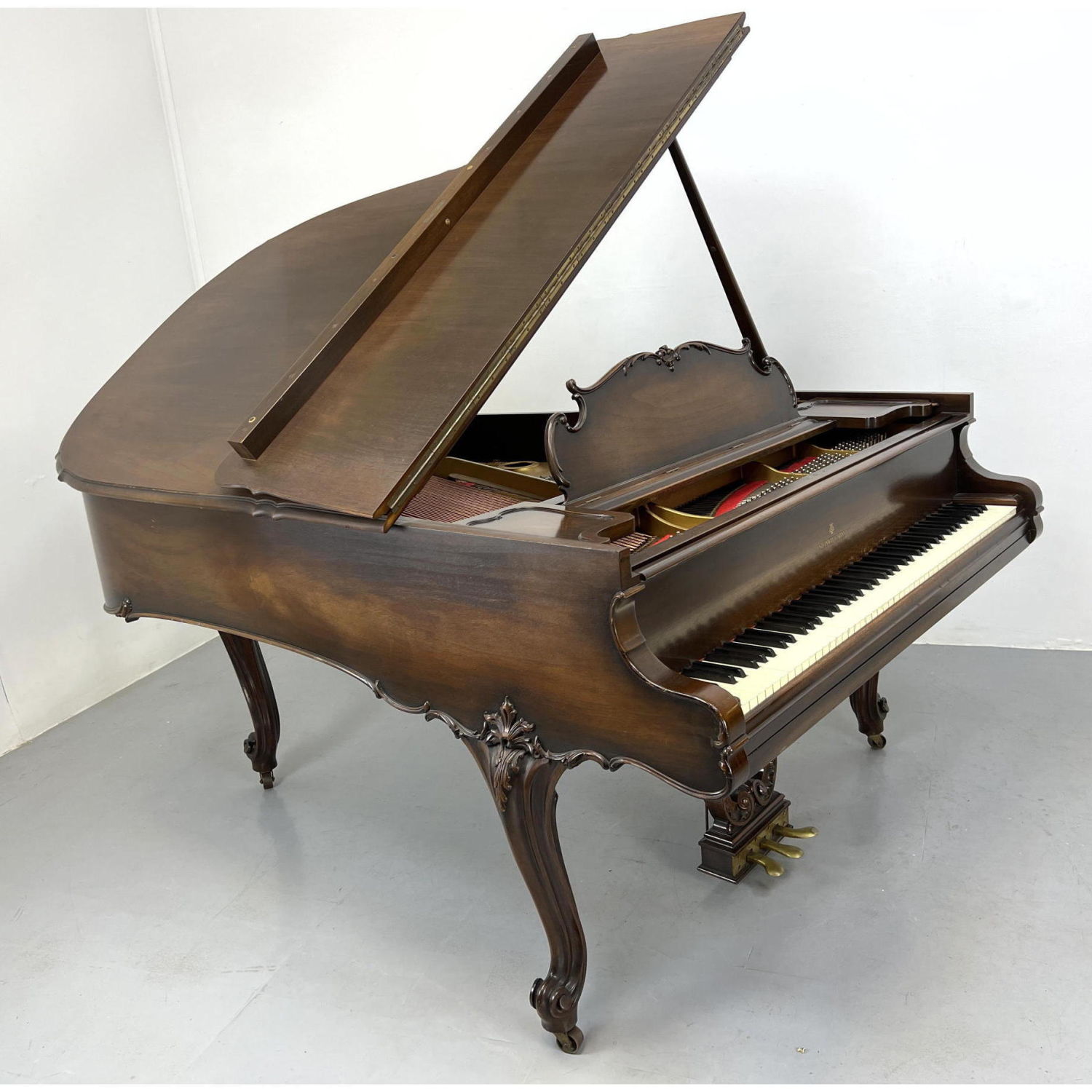 STEINWAY Model L baby grand piano.