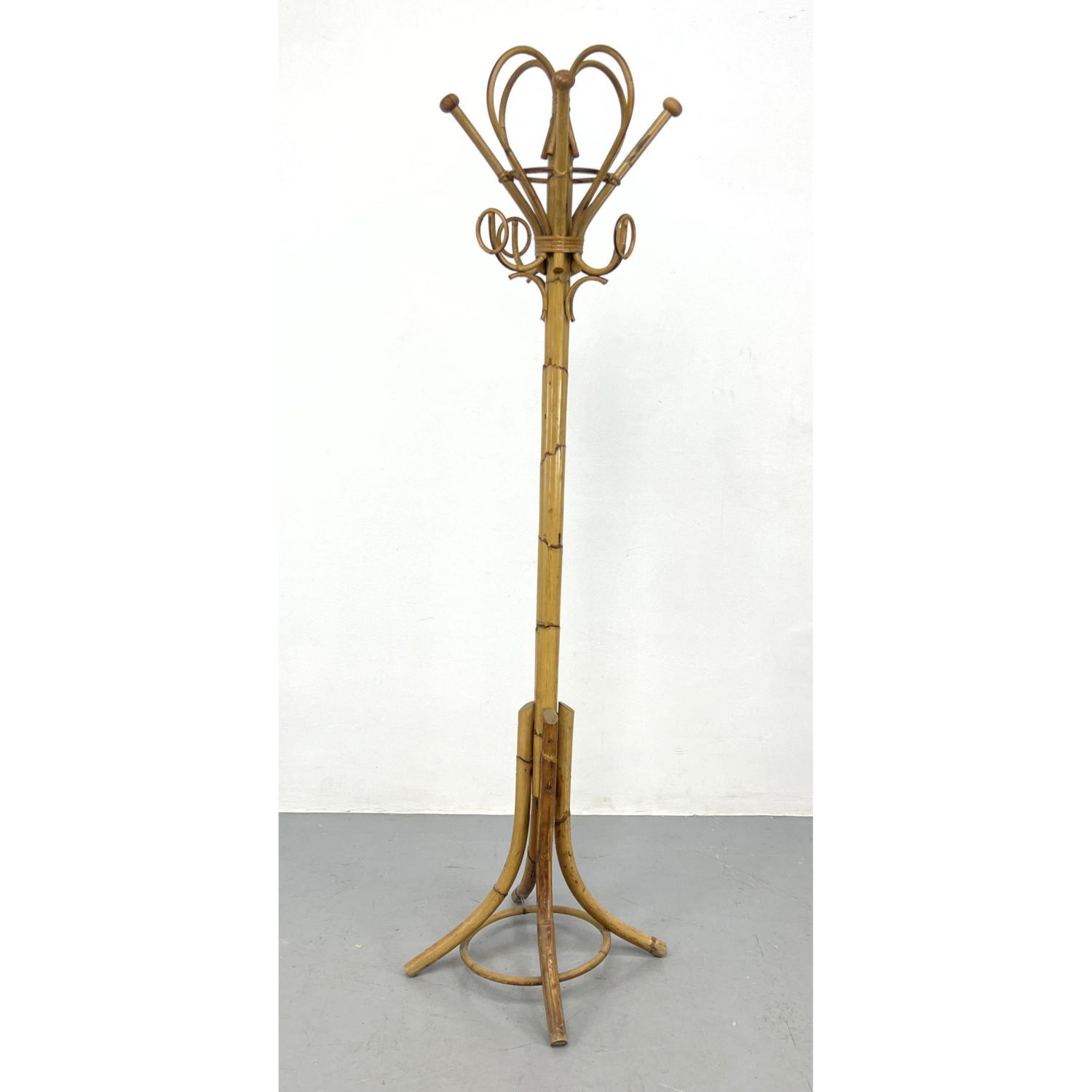 Vintage French rattan coat rack.