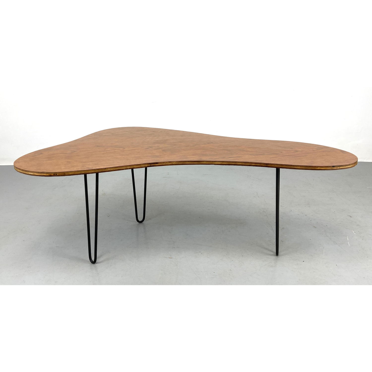 Kidney shaped cocktail table. Hairpin