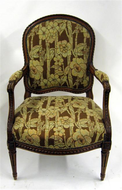 Louis XVI style walnut fauteuil