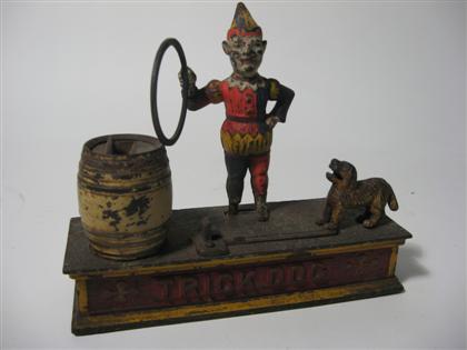 Painted trick dog cast-iron bank   