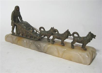 Bronze figure of a dog sled   