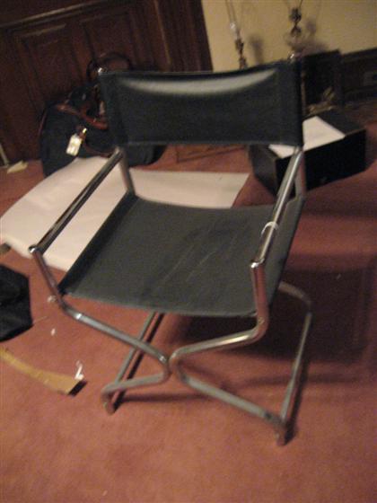 Black director's chair        PROVENANCE: