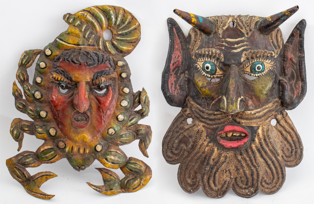 TWO MEXICAN POLYCHROMED TIN MASKS  2fcc8b