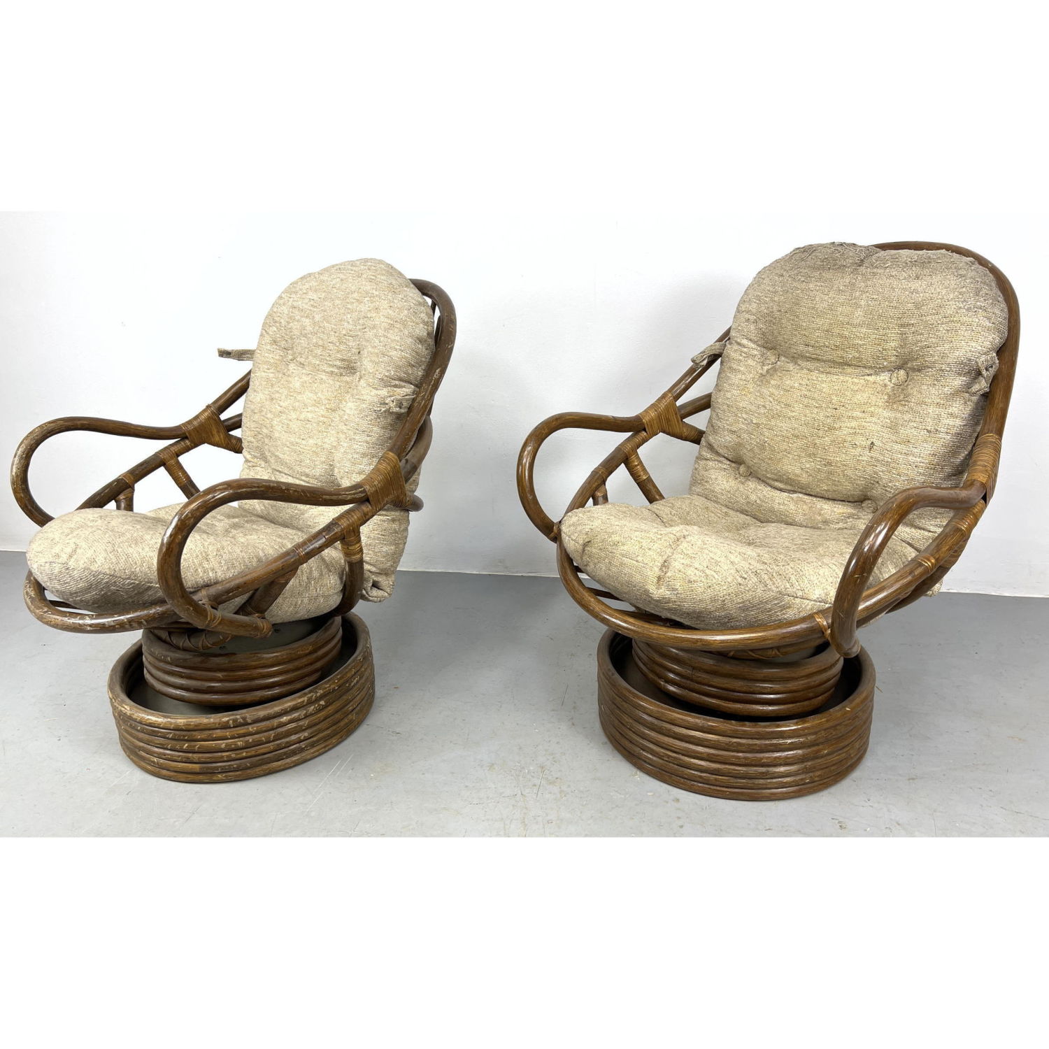 Pair Rattan Swivel Lounge Chairs  2fd028