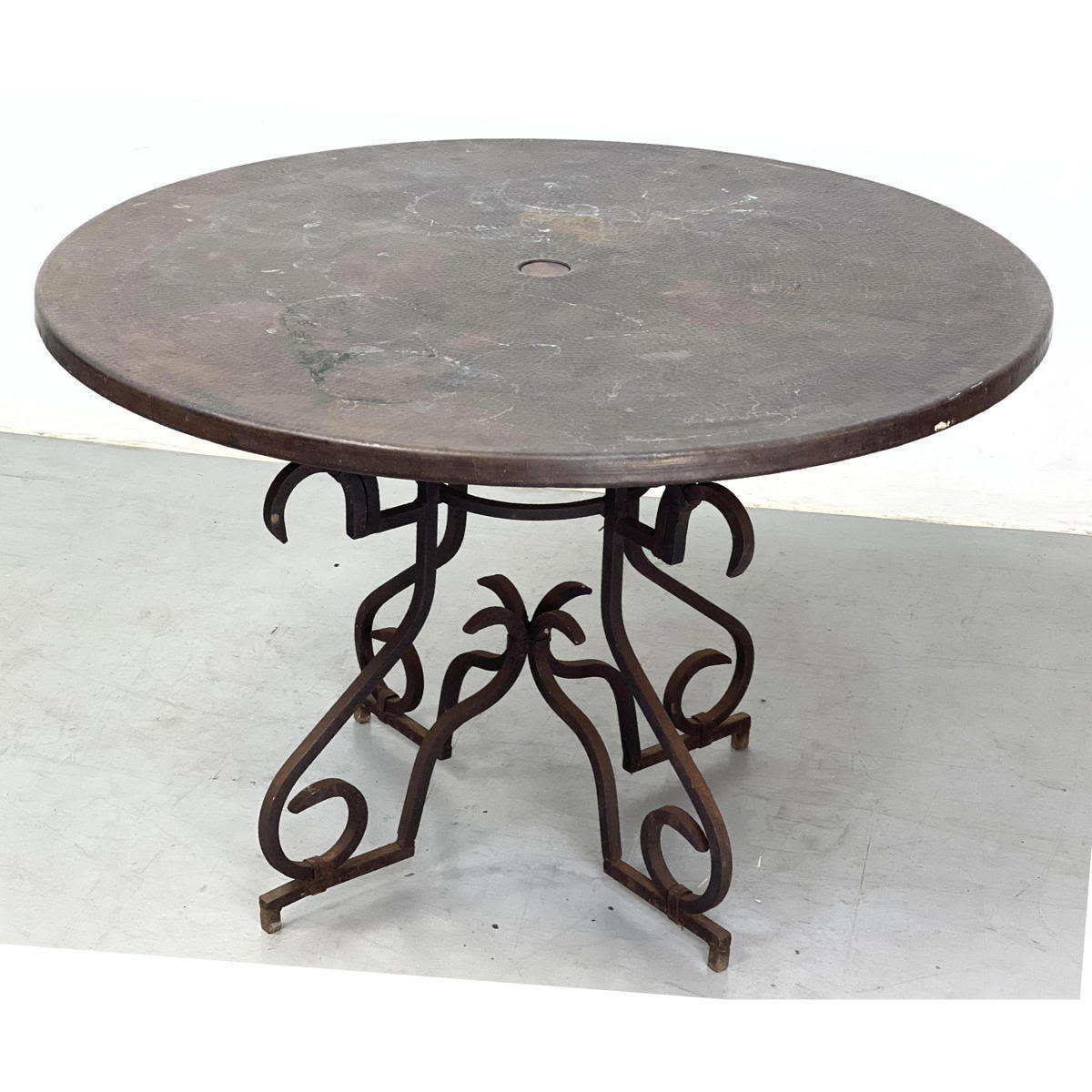 Hammered copper garden table with