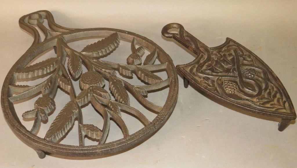 2 CAST IRON TRIVETSca. 1840-1860;