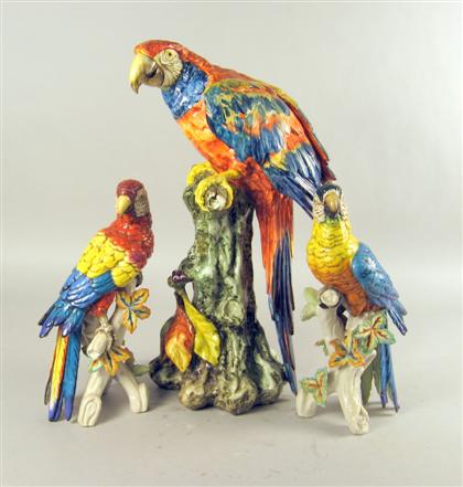 Three Continental porcelain parrots