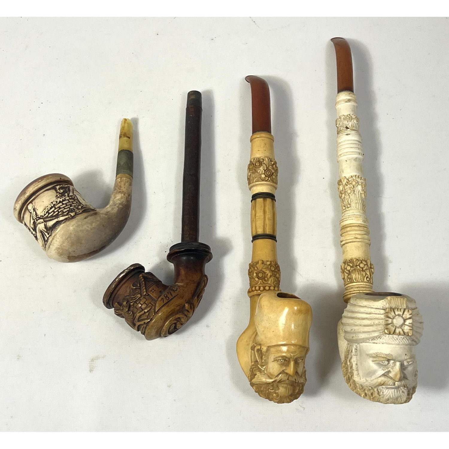 Collection of 4 Antique Smoking Pipes.