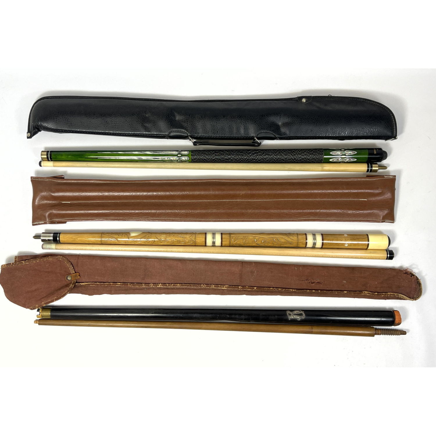 Collection of Three Pool Cues in Carry