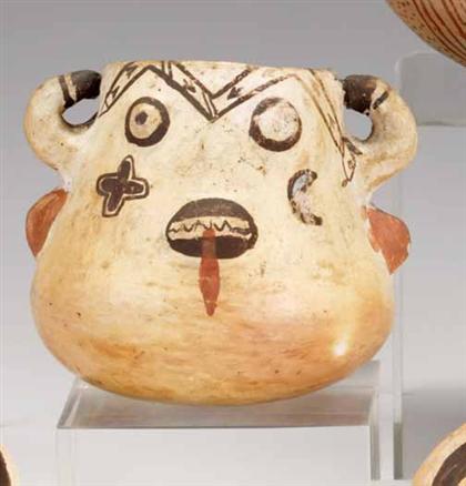 Polychrome effigy jar      H: 