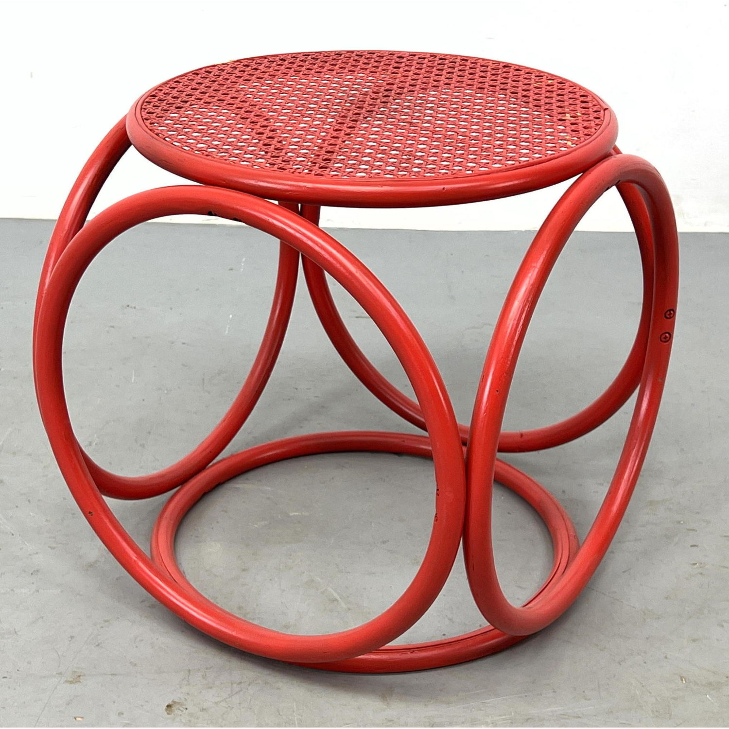 Red Thonet style caned ottoman 2ff2f9