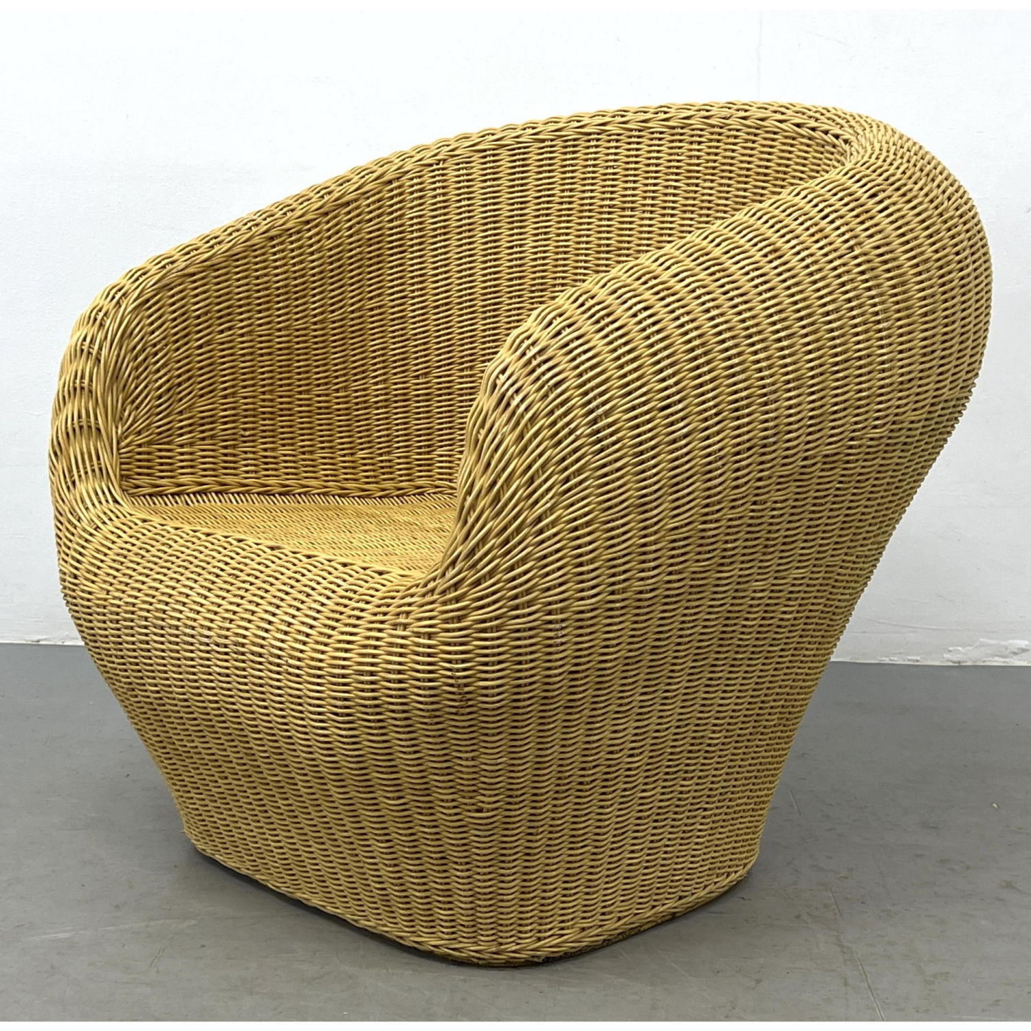 Modernist Woven Rattan Lounge Chair.