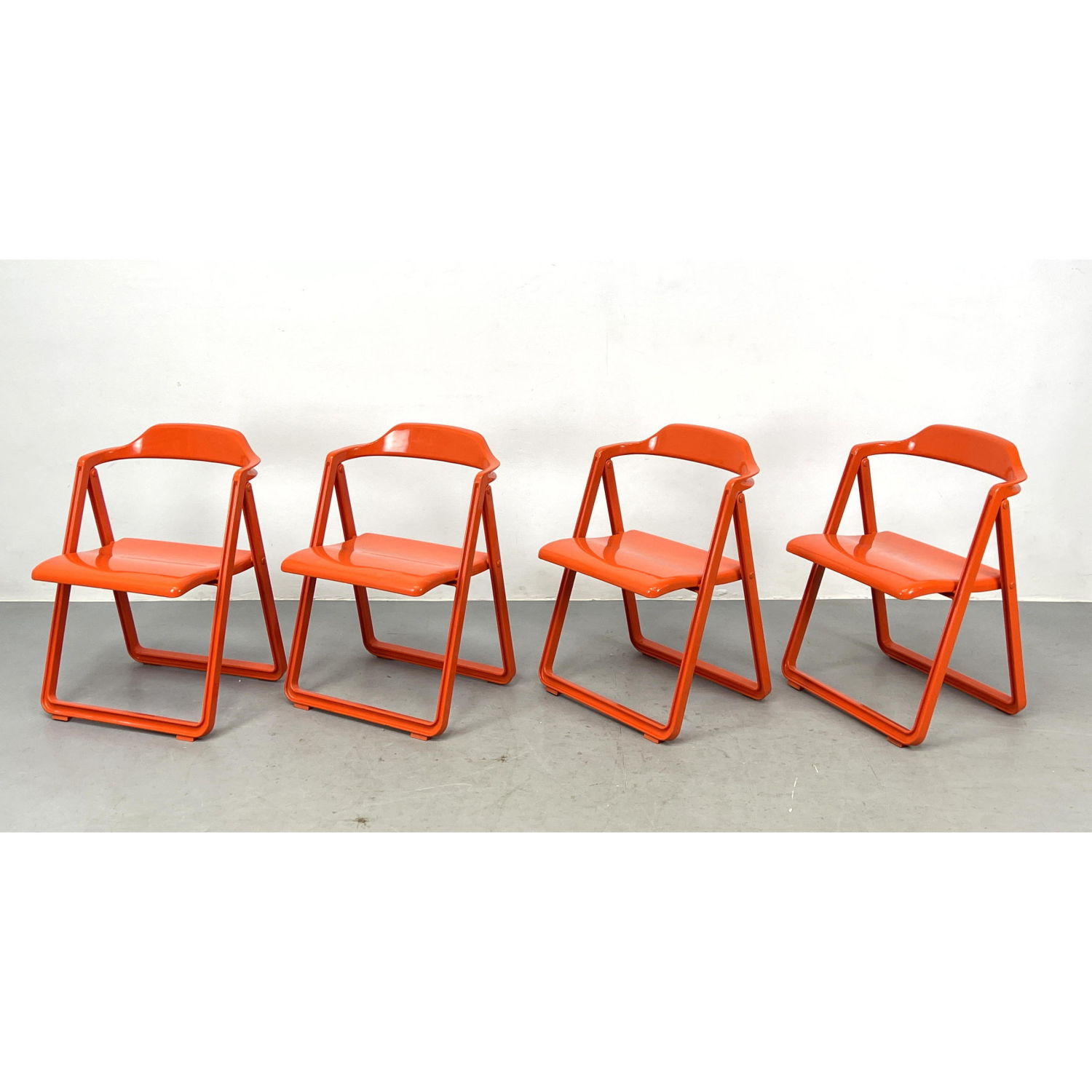 4 Orange Borbona Folding Chairs