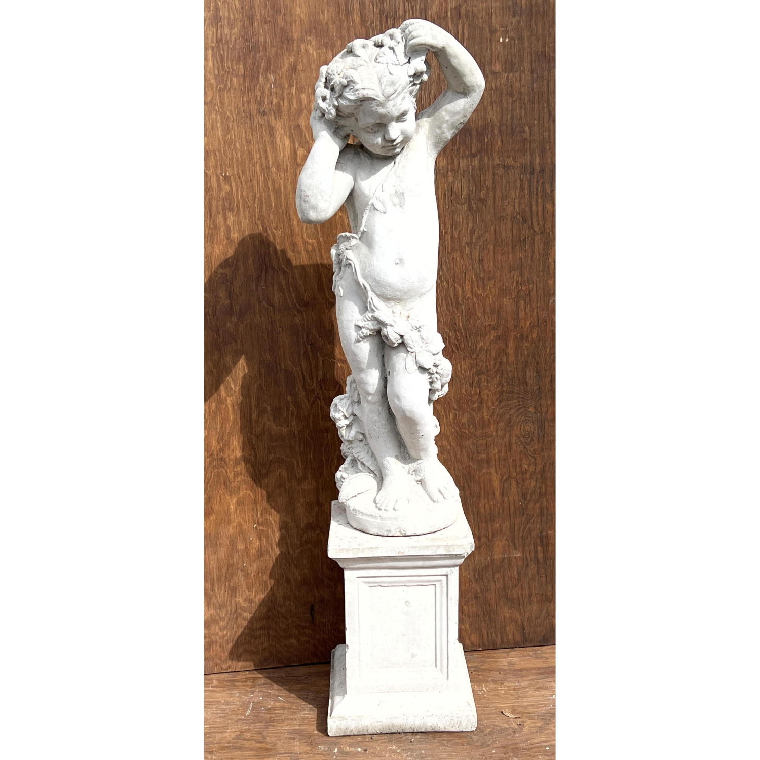 Cast Concrete Cherub Figural Sculpture.